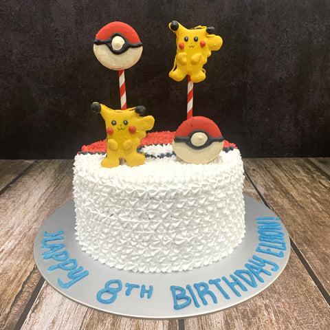 Pokemon Pokeball Cake (with small Pikachu and pokeball macarons)
