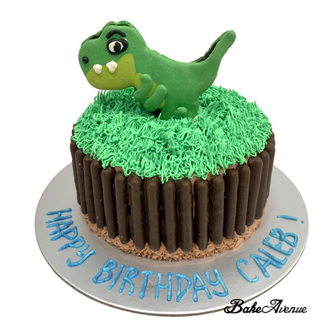 Dinosaur Macaron Topper Cake with chocolate fingers
