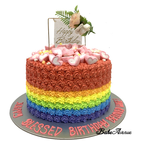 Rainbow Cake with marshmallows and Happy Birthday topper